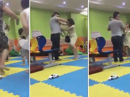 Mặc con nhỏ đứng nhìn, cặp đôi vẫn lao vào đánh nhau vì chuyện