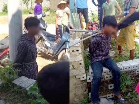 Xôn xao clip nam thanh niên trộm gà bị người dân dùng kìm kẹp cổ, trói vào cột điện