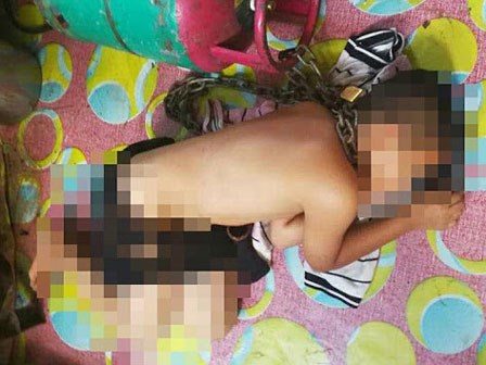 Con trốn học bị bố phạt lột trần, xích cổ vào bình ga đến bất tỉnh khiến dư luận phẫn nộ