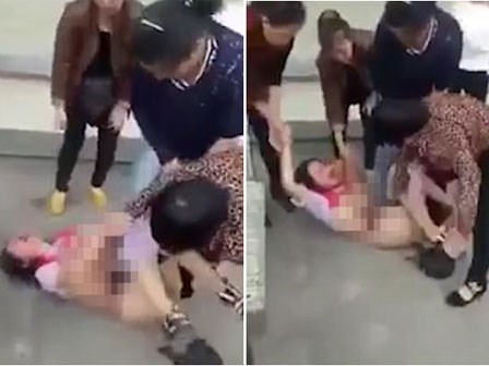 Mặc cô bồ đang có bầu van xin thảm thiết, bà vợ Hoạn Thư cứ giày cao gót nện thẳng bụng trước khi lột đồ