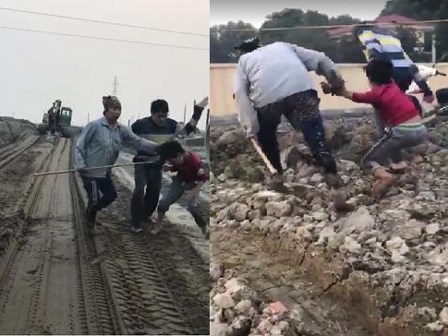 Cậu bé bẻ trộm ngô bị người phụ nữ cùng con trai đánh liên tiếp vào mặt và người