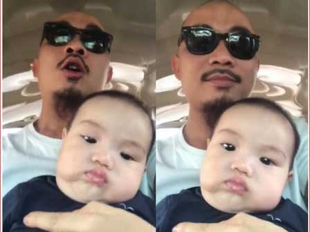 Hài hước clip ông bố trẻ chế nhạc dỗ con trai nhưng cậu bé quyết giữ gương mặt 'lạnh như tiền'