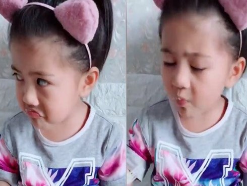 Cô bé vừa ăn vừa hát làm tan chảy trái tim người nghe