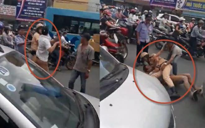 Cảnh sát giao thông quật ngã lái xe taxi giữa phố-1