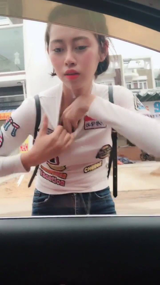 Dân tình đối đầu khi xem clip cô gái Việt vô tư chỉnh áo ngực trước cửa kính ô tô hút 10 triệu view-3