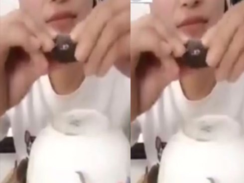Rùng mình xem cô gái xinh đẹp ăn cua sống