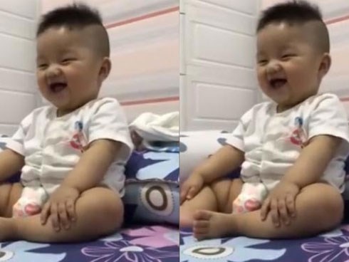 Nụ cười ma thuật của cậu bé xua tan mọi nỗi buồn