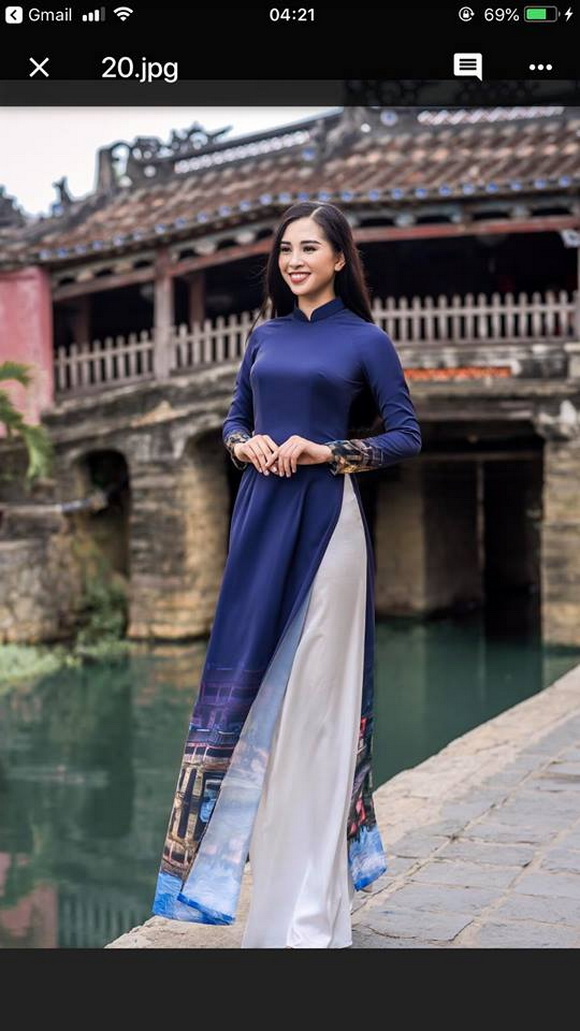Trọn vẹn vẻ đẹp mộc mạc của Hoa hậu Trần Tiểu Vy trong bộ ảnh áo dài chụp tại Hội An-9
