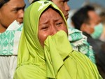 Số người tử vong do động đất tăng cao, Indonesia chọn phương án chôn tập thể-4