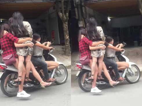 Xôn xao cảnh 5 kiều nữ đầu trần đu bám trên chiếc xe máy lao vun vút ở Hà Nội