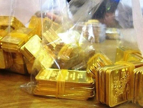 Giá vàng hôm nay 23/11: Vàng tăng vọt, USD chìm dần-2