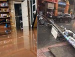 Clip: Vật lộn giữa dòng nước chảy xiết trên đường phố Sài Gòn, xe máy suýt bị cuốn trôi-6
