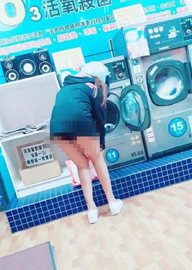 Cô gái thản nhiên cởi quần trong cửa hàng tự giặt đồ khiến nam thanh niên choáng váng-1