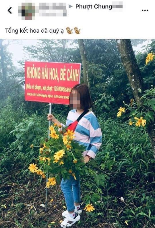 Tay phải cầm biển cấm, tay trái làm luôn điều cấm, dân mạng hỏi cô gái: Có biết đọc không?-1