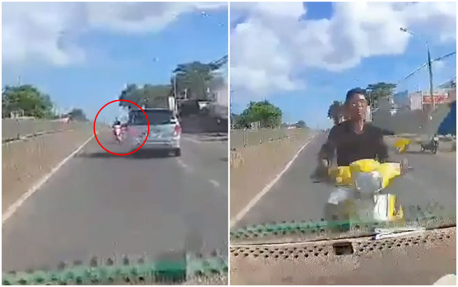 Clip sốc: Phóng xe máy ngược chiều trên quốc lộ, nam thanh niên lao thẳng vào đầu ô tô bị thương nặng-1