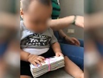 Từ clip em bé nghịch cọc tiền trên MXH, cảnh sát Anh triệt phá băng nhóm người Việt trồng cần sa trị giá triệu đô Từ clip em bé nghịch cọc tiền trên MXH, cảnh sát Anh triệt phá băng nhóm người Việt trồng cần sa trị giá triệu đô