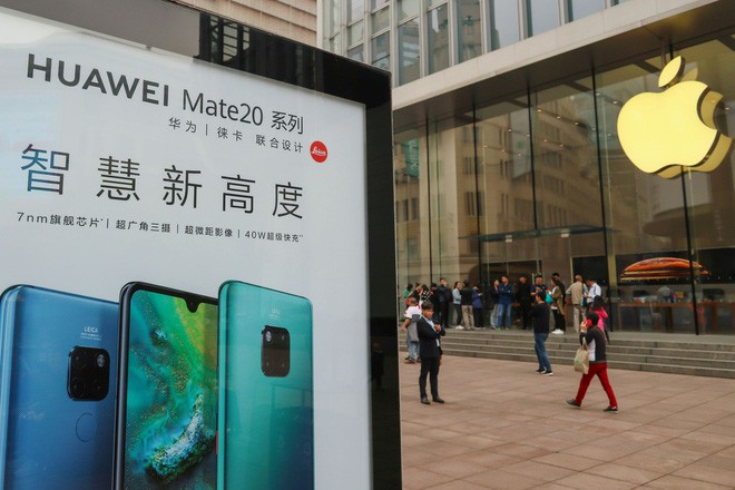 Apple bị tẩy chay bởi hàng trăm công ty Trung Quốc: Ai theo sẽ được tặng smartphone Huawei, ai dùng iPhone sẽ bị sa thải-1