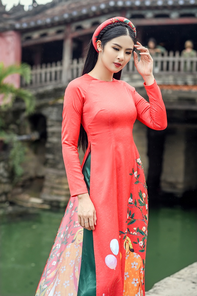 Hoa hậu Ngọc Hân diện áo dài truyền thống lấy cảm hứng từ ca dao tục ngữ-1
