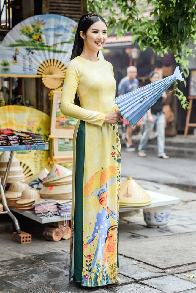 Hoa hậu Ngọc Hân diện áo dài truyền thống lấy cảm hứng từ ca dao tục ngữ-11