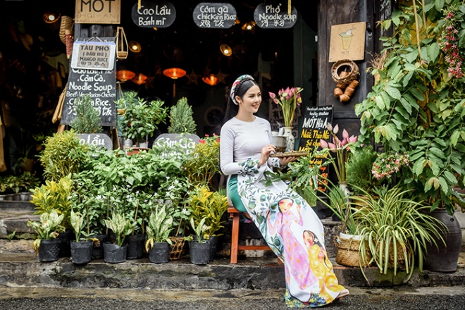 Hoa hậu Ngọc Hân diện áo dài truyền thống lấy cảm hứng từ ca dao tục ngữ-6