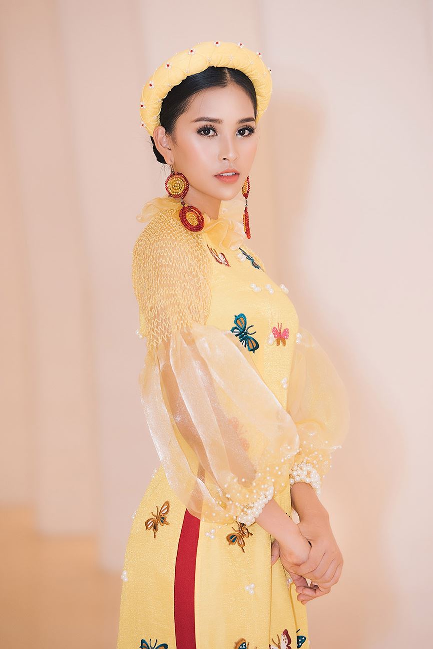 Hoa hậu Tiểu Vy đẹp mơ màng với áo dài, làm vedette sàn catwalk-5