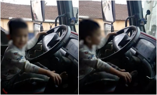 Xôn xao việc bố quay clip con trai lái xe tải băng băng trên đường: Chỉ là diễn vì xe được kéo đi?-1