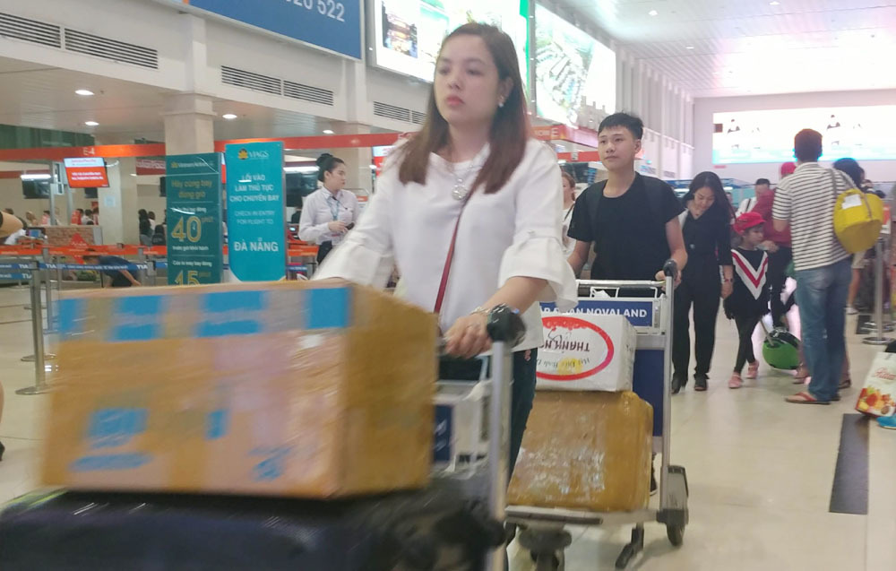 Tân Sơn Nhất khuyến cáo khách không bịt mặt đến sân bay dịp Tết-1