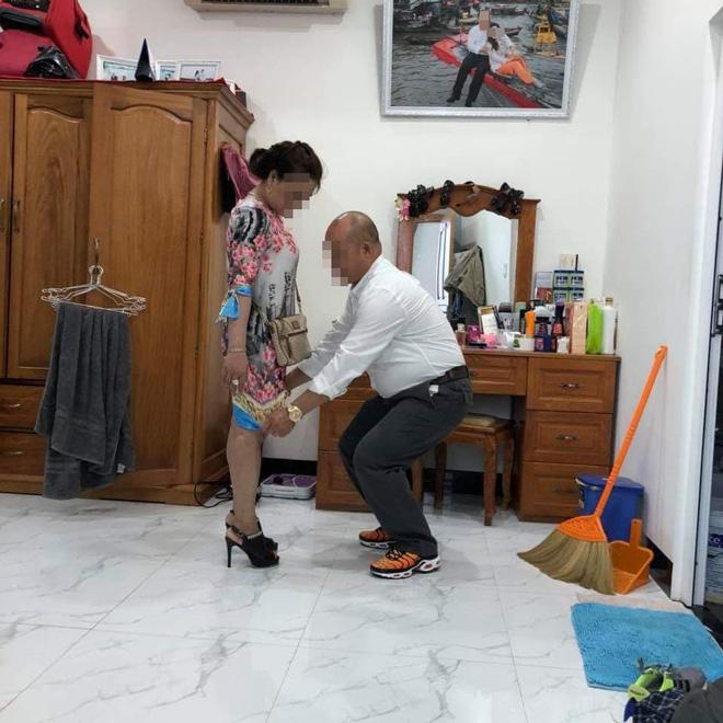 Bức ảnh người đàn ông kéo váy vợ khiến dân mạng xôn xao: Quan tâm hay chỉ là ích kỷ?-1