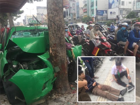 Sau va chạm trên đường, xe taxi tông mạnh vào gốc cây xanh ở Sài Gòn khiến 2 người nhập viện cấp cứu