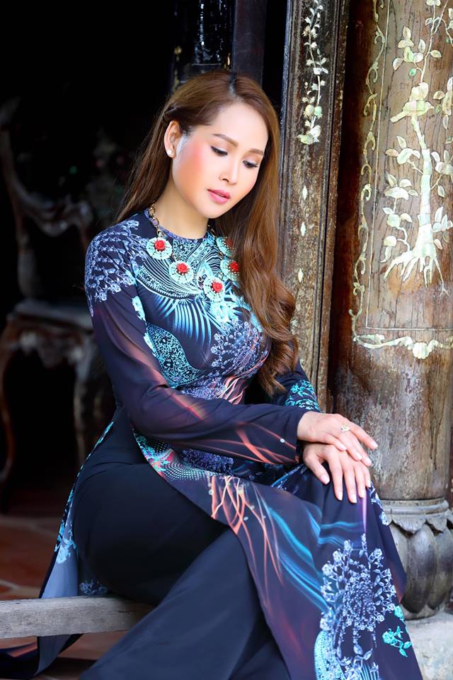 Gái nhảy Minh Thư khoe đường cong quyến rũ qua tà áo dài-1