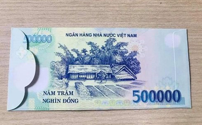 Sử dụng bao lì xì có hình tiền Việt Nam sẽ bị phạt đến 80 triệu đồng-1