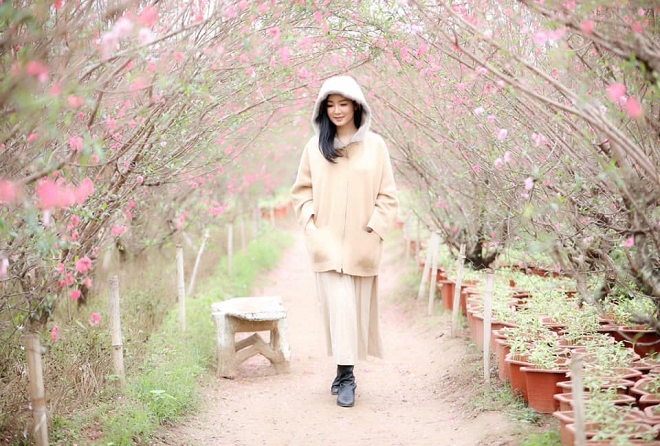 Hoa hậu Giáng My đầy mơ mộng trong khoảnh khắc khi đất trời chuyển sang xuân-5