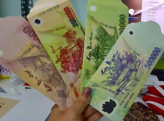 Bất chấp việc có thể bị phạt đến 80 triệu đồng, bao lì xì in hình tiền Việt Nam với nhiều mệnh giá vẫn được rao bán công khai trên mạng xã hội-1