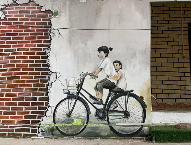 Bức tranh tường nổi tiếng của Penang khi về đến Việt Nam bỗng khiến người xem khóc thét-2