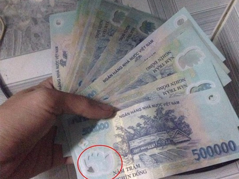 Phá đường dây sản xuất tiền giả ở TP.HCM-3