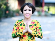 Việt Hương lạ lẫm trong mái tóc ngắn đi hành hương đầu năm