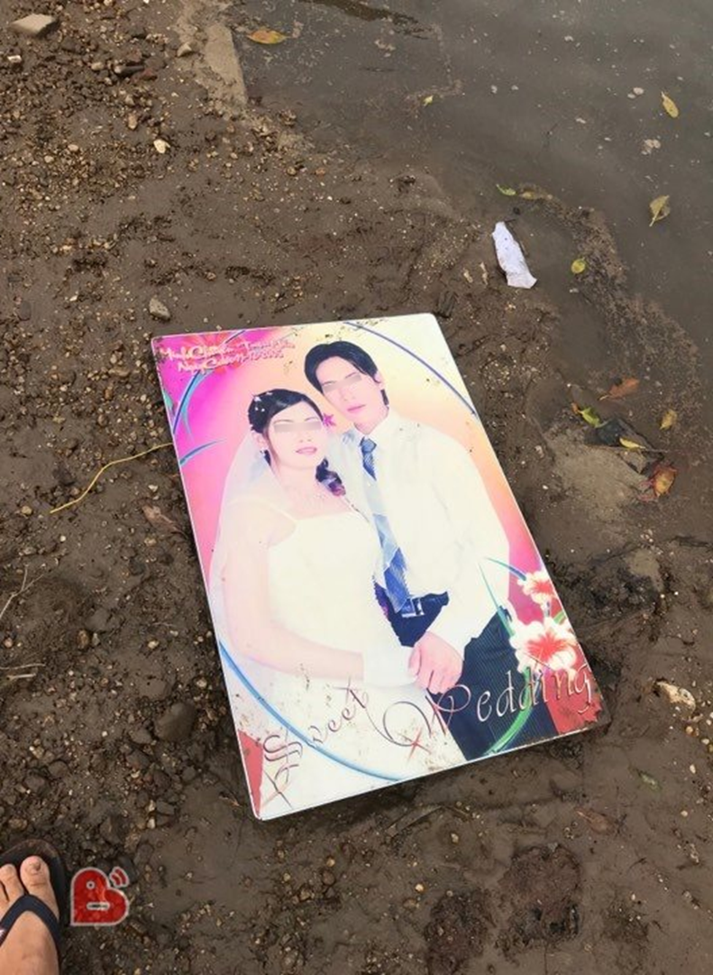 Vợ bỏ theo trai, người đàn ông mang ảnh thuở còn mặn nồng ra rải khắp bờ sông-2