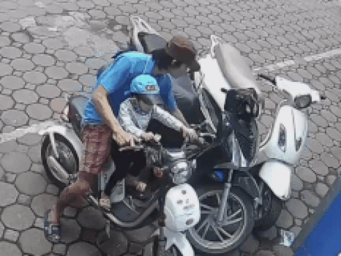 Nữ cảnh sát gửi con nhỏ, chạy bộ hơn 1 km truy bắt trên trộm-1