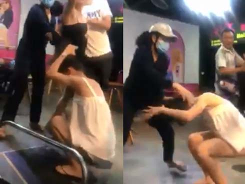 Gặp nhân tình của chồng, vợ lấy giày cao gót đánh hộc máu giữa phố-3