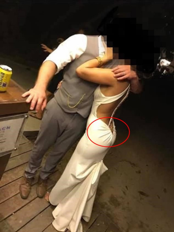 Ảnh chụp cô dâu chú rể gây tranh cãi trên MXH chỉ vì một chi tiết phá cách” nhỏ xíu trên chiếc váy cưới-1