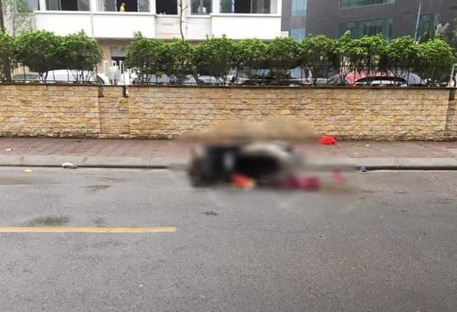 Bàng hoàng phát hiện thi thể người phụ nữ nằm cạnh xe máy giữa đường lúc rạng sáng-1