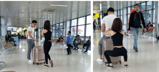 Cặp đôi hồn nhiên tập squat, bồng bế nhau như nâng tạ ở giữa sân bay khiến nhiều người ngỡ ngàng-1