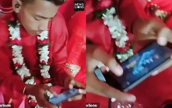 Cô dâu ngồi bên nhưng chú rể chỉ cắm mặt chơi điện tử, hất tay khách tặng quà gây xôn xao dư luận-1