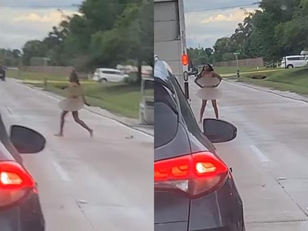 Tranh chấp giao thông, người phụ nữ đột nhiên lột quần áo làm điều kỳ lạ giữa đường cao tốc-1