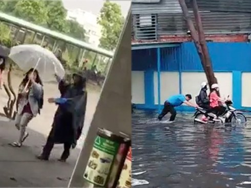 Clip bác bảo vệ che ô, lội nước đẩy xe cho sinh viên giữa trời mưa gió khiến dân mạng tan chảy vì quá đáng yêu