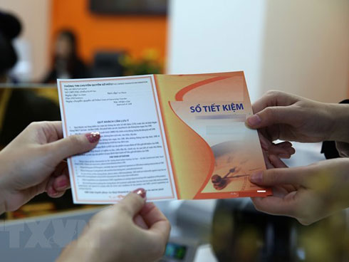 Ngân hàng Nhà nước cảnh báo rủi ro cho vay cầm cố sổ tiết kiệm-2