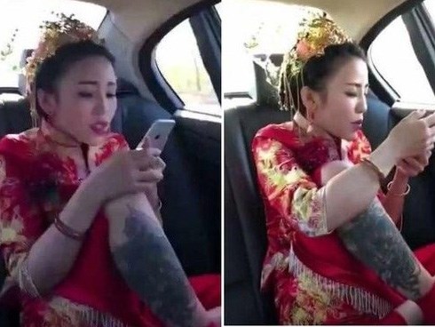 Cô dâu xăm trổ ngồi 'duyên hết nấc', biểu cảm của chú rể còn đáng chú ý hơn
