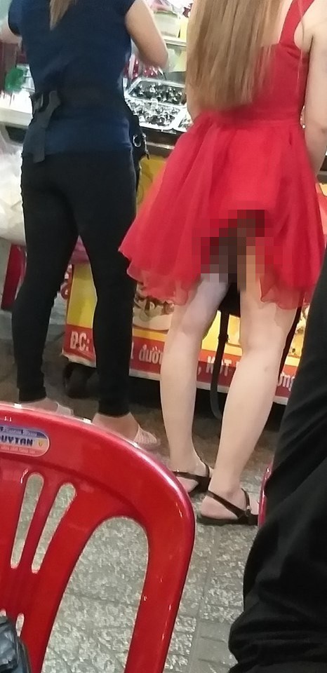 Chụp ảnh cô gái váy đỏ dính tai nạn nhạy cảm, người đàn ông bị dân mạng chỉ trích-1