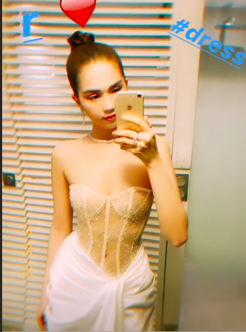 Sau bộ đầm có như không, Ngọc Trinh tái xuất táo bạo hơn, netizen bình luận: Trông giống bikini quấn khăn tắm-1