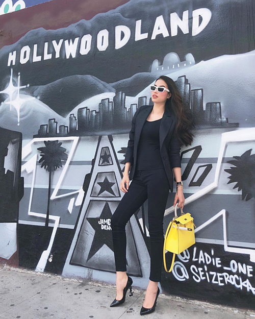 Ngọc Trinh liên tục mặc đồ tập bó sát ra phố - Thư Dung diện đầm maxi xẻ ngực sâu hun hút-3